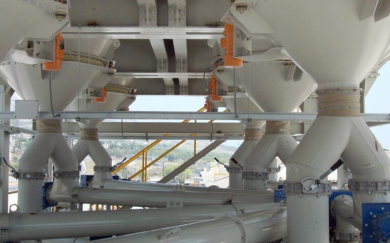 vibrating bin discharger systems