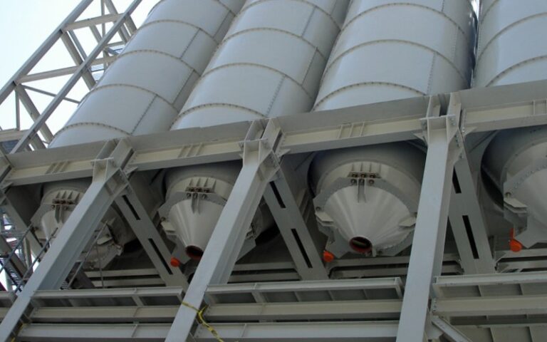 vibrating bin discharger systems